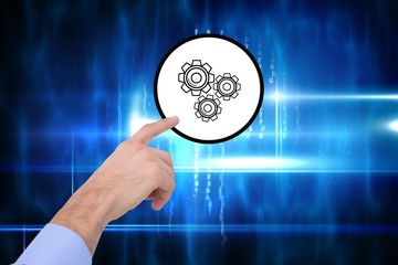 hand pointing to graphic with technology background