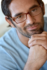 Portrait of 30-year-old man with eyeglasses on