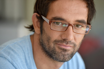 Portrait of 30-year-old man with eyeglasses on