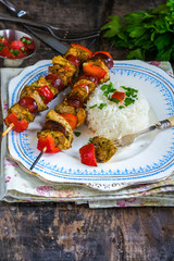 Grilled meat kebabs, spicy chorizo and red pepper on skewers