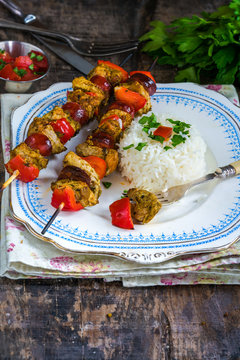 Grilled meat kebabs, spicy chorizo and red pepper on skewers