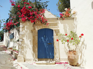 Naklejka premium door achitecture detail in hotel building Greece