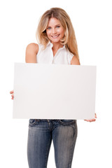 Naklejka premium Young woman holding blank sign on white