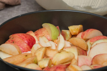 Apples are for pie on a baking sheet.