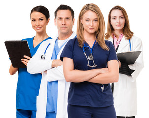 Man and three women doctors nurses isolated on white background