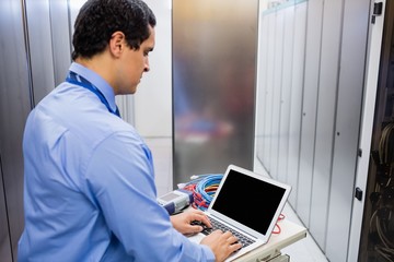 Technician using laptop