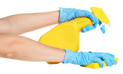 Woman spraying household cleaner on white