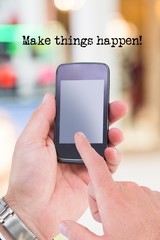 hand using smartphone with graphics