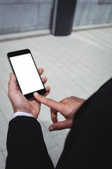 Businessman using mobile phone