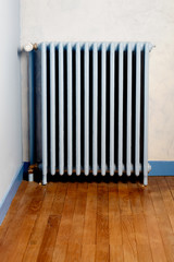Hot water steam radiator heater in home
