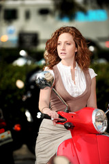Fototapeta na wymiar Woman college university student on scooter