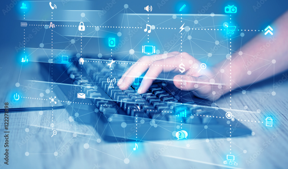 Poster hand pressing keyboard with high tech media icons