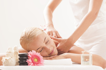 Fototapeta na wymiar Blonde Woman Getting Spa Massage 