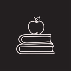 Books and apple on top sketch icon.