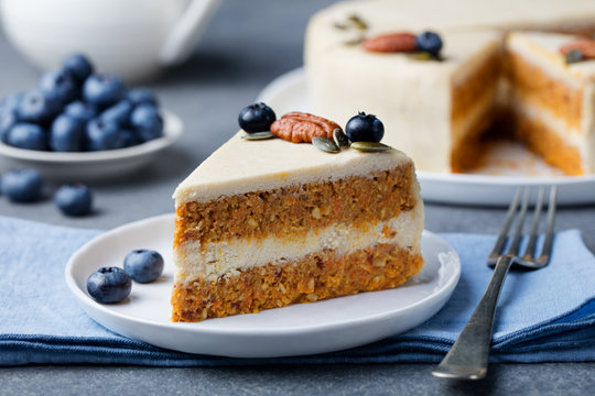 Vegan, raw carrot cake. Healthy food. Grey stone background Top view Copy space. Selective focus