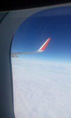 Clouds and blue sky from window