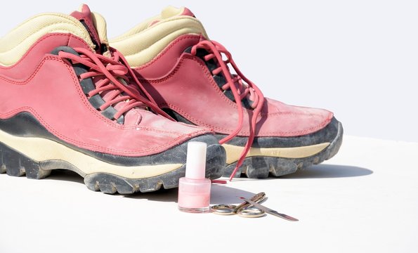 Pink working boots and manicure set, strong feminine woman concept