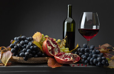 Ripe juicy grape and glass of wine