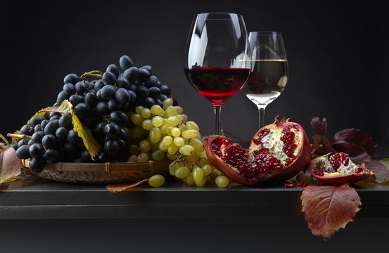 Ripe juicy grape and glass of wine