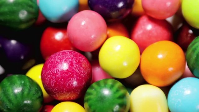 Multi-colored sweets, lollipops and chewing gum