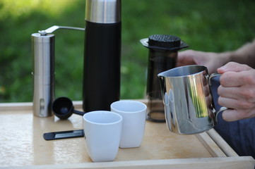 Man making coffee in nature