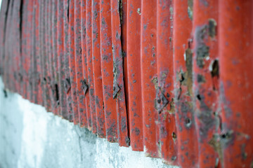 Old red rusty metal wavy texture