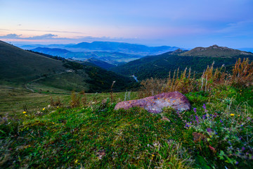 Amazing panoramic landscape with purple sunset clouds and mountains, Armenia