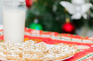 Christmas cookies and a glass of milk on the table