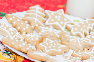 Christmas cookies and a glass of milk on the table