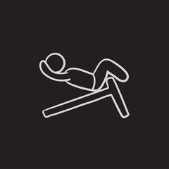Man doing crunches on incline bench sketch icon.