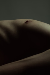 Art photography concept. Body parts of young handsome man - chest