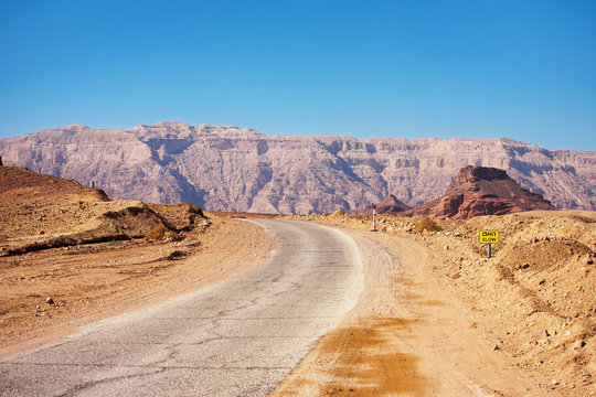 Road running through Timna National Park in the Negev Desert nea