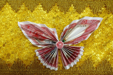 Origami. Lao bank note. 