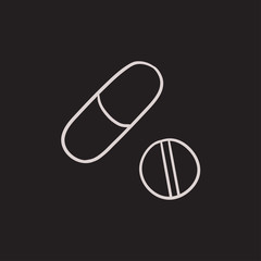 Pills sketch icon.