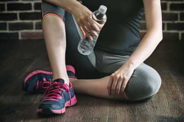 pick up bottle water after fitness exercise training, gym lifest