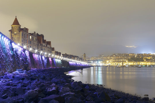 Coast of Getxo, Basque Country, Spain. At night with a cloudy sky.