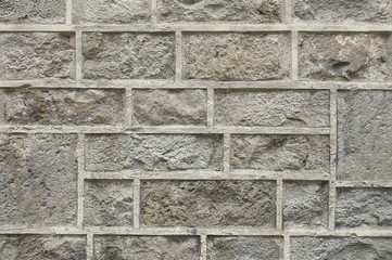 Old grey stone wall background texture