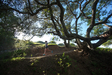 Woman trail running, San Luis Obispo