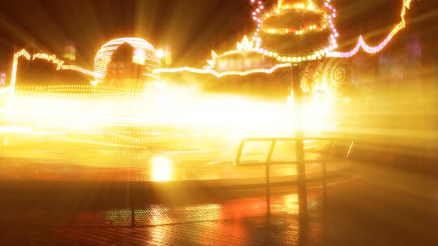 A time lapse of a carnival carousel ride.