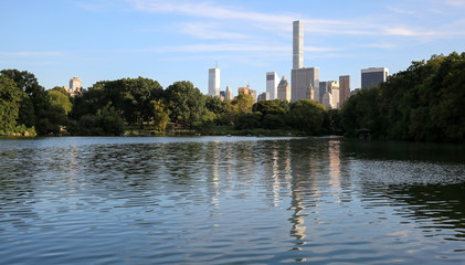 Fototapeta na wymiar New York City Skyline reflected in Central Park Lake