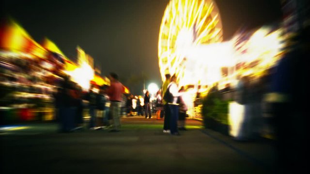 An abstract time lapse of the midway at the fair.