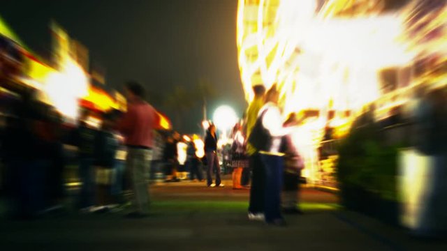 An abstract time lapse pushing into the midway.