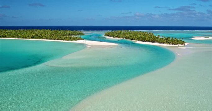 Aerial view of beautiful tropical island lagoon white sand beach in South Pacific