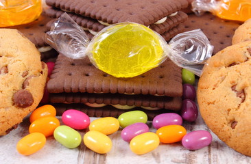 Heap of colorful candies and cookies, too many sweets