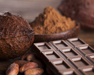 Cocoa pod and chocolate bar and food dessert background