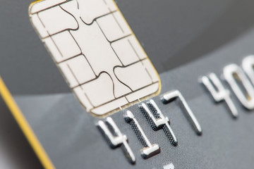 EMV chip on a credit card close up.