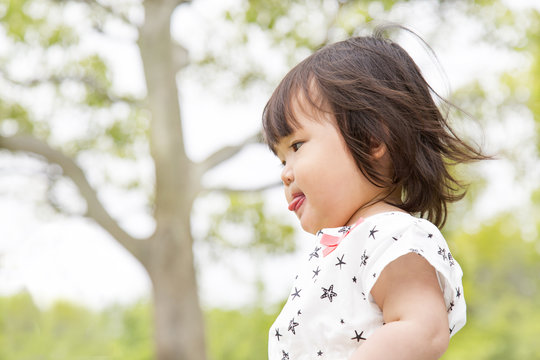 舌を出す女の子の横顔 Stock Photo Adobe Stock