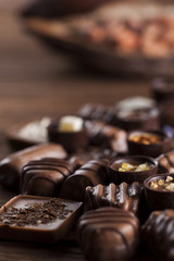 Praline Chocolate on wooden backgroud