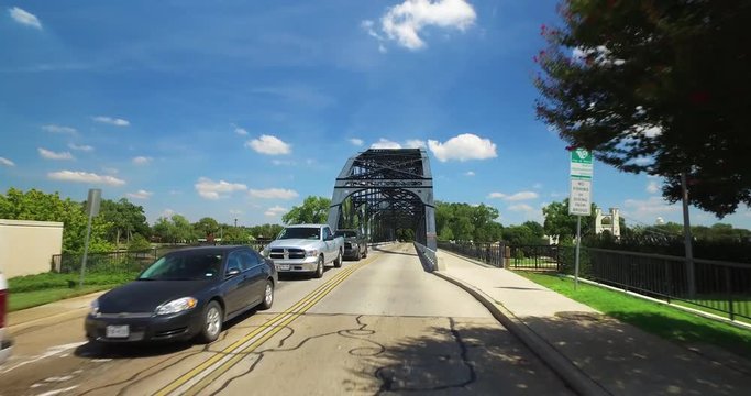 A driver's perspective on the Washing Avenue Bridge over the Brazos River in Waco, Texas.  	