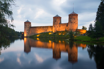 View of the fortress Olafsborg in the summer twilight. Savonlinna, Finland